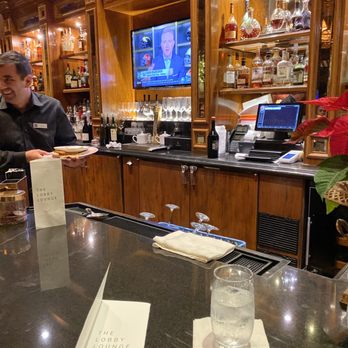 Lobby Lounge - a man sitting at a bar - Resorts Near Me - San Diego, California Lobby Lounge - a man sitting at a bar - Resorts Near Me - San Diego, California