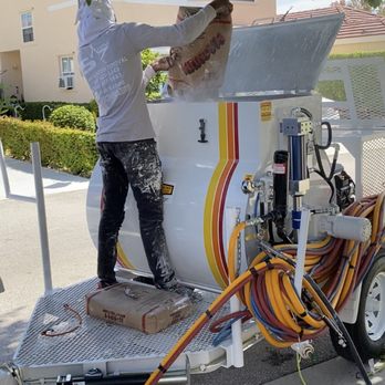Five Star Popcorn Removal - Mixing material to spray knockdown texture. - General Contractors Near Me Five Star Popcorn Removal - Mixing material to spray knockdown texture. - General Contractors Near Me