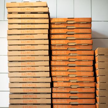 Blaze Pizza - a stack of pizza boxes on a counter - Salad Near Me - Surrey, British Columbia Blaze Pizza - a stack of pizza boxes on a counter - Salad Near Me - Surrey, British Columbia