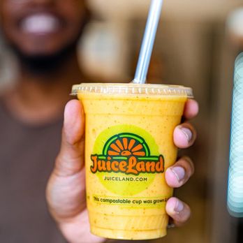 JuiceLand - a person holding a cup of juice - Juice Bars & Smoothies Near Me - Houston, Texas JuiceLand - a person holding a cup of juice - Juice Bars & Smoothies Near Me - Houston, Texas