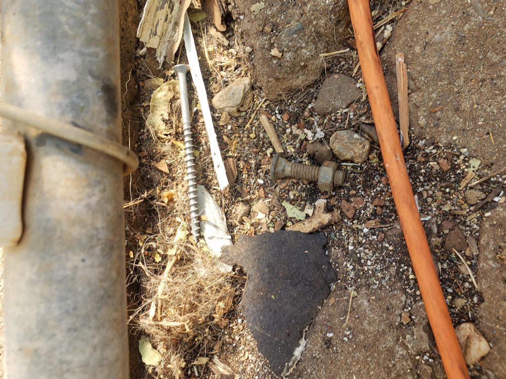 Slide of Tugwell Roofing