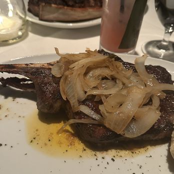 Steak 48 - Bone-in Ribeye* **with sautéed onions - Steakhouses Near Me - Charlotte, North Carolina Steak 48 - Bone-in Ribeye* **with sautéed onions - Steakhouses Near Me - Charlotte, North Carolina