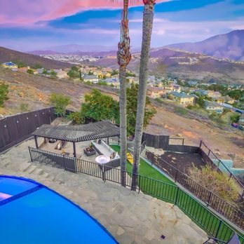 Brian Bazinet Compass Real Estate - Backyard with pool, sunset, fruit trees, and Mountain View. - Real Estate Agents Near Me - San Diego, California