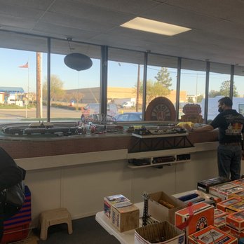 Arnie's Model Trains - Brad running the trains with smoke effect - Toy Stores Near Me - Westminster, California
