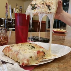 Sicilian with fresh garlic and basil, cheesy goodnes, one of the best Sicilian slices.