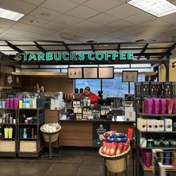 QFC - There is a very limited seating area just to the right, for consuming your Java and soup on site.