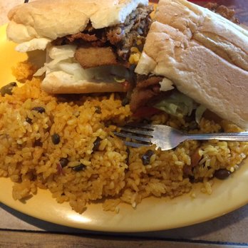 Ponce Restaurant - Breaded steak sandwich with rice - Puerto Rican Near Me - Chicago, Illinois Ponce Restaurant - Breaded steak sandwich with rice - Puerto Rican Near Me - Chicago, Illinois