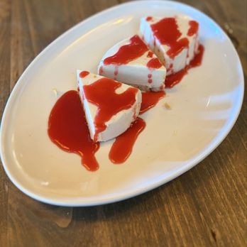 Picazzo's Healthy Italian Kitchen - Vegan New York Style Cheezecake with Strawberry sauce - Gluten-Free Near Me - Glendale, Arizona Picazzo's Healthy Italian Kitchen - Vegan New York Style Cheezecake with Strawberry sauce - Gluten-Free Near Me - Glendale, Arizona