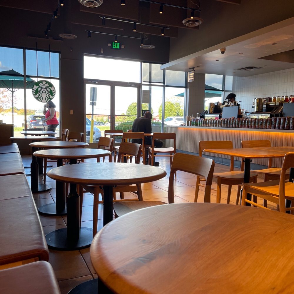 Low tables, I'm 5'-3" and have to hunch down. Your back hits the wall art. No barrier between employees making drinks and general public. Low tables, I'm 5'-3" and have to hunch down. Your back hits the wall art. No barrier between employees making drinks and general public.