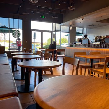 Starbucks - Low tables, I'm 5'-3" and have to hunch down. Your back hits the wall art. No barrier between employees making drinks and general public. - Coffee & Tea Near Me - Chesterfield, Virginia Starbucks - Low tables, I'm 5'-3" and have to hunch down. Your back hits the wall art. No barrier between employees making drinks and general public. - Coffee & Tea Near Me - Chesterfield, Virginia