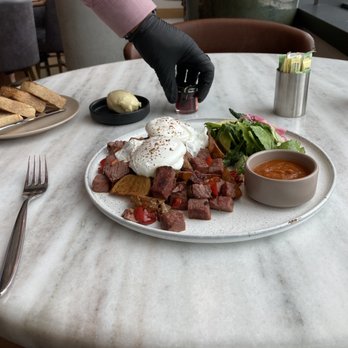 Quail + Crane - Corned beef hash w/ salad, poached eggs and potatoes. - Breakfast & Brunch Near Me - San Francisco, California Quail + Crane - Corned beef hash w/ salad, poached eggs and potatoes. - Breakfast & Brunch Near Me - San Francisco, California