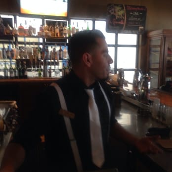 Twenty6 - Victor's signature white tie and suspenders. - New American Near Me - La Quinta, California Twenty6 - Victor's signature white tie and suspenders. - New American Near Me - La Quinta, California