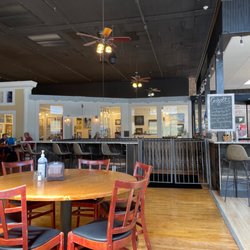 Right of the door, a wine bar, art gallery, more seating