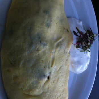 Joan's on Third - Bonne Femme Omelette (bacon, potato, onion, and cheese) with sour cream - Breakfast & Brunch Near Me - Los Angeles, California Joan's on Third - Bonne Femme Omelette (bacon, potato, onion, and cheese) with sour cream - Breakfast & Brunch Near Me - Los Angeles, California
