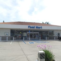 the front of a food mart the front of a food mart