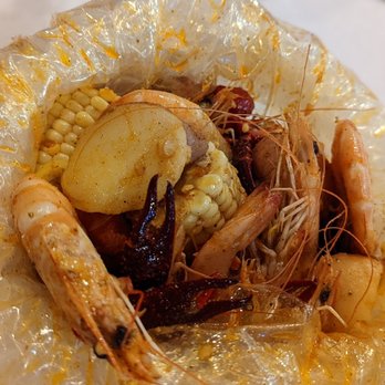 Cap't Loui - Close up view head on shrimp, crawfish, corn and potatoes - Seafood Near Me - Cupertino, California Cap't Loui - Close up view head on shrimp, crawfish, corn and potatoes - Seafood Near Me - Cupertino, California