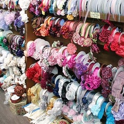 Yards of Fabric - Tons of ribbon and trims, along with finished examples for sale.