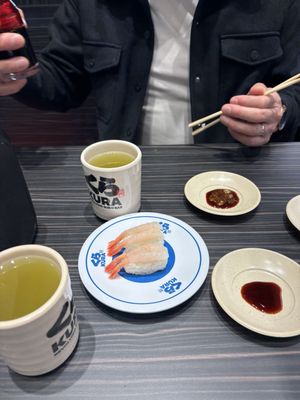 Kura Revolving Sushi Bar by null