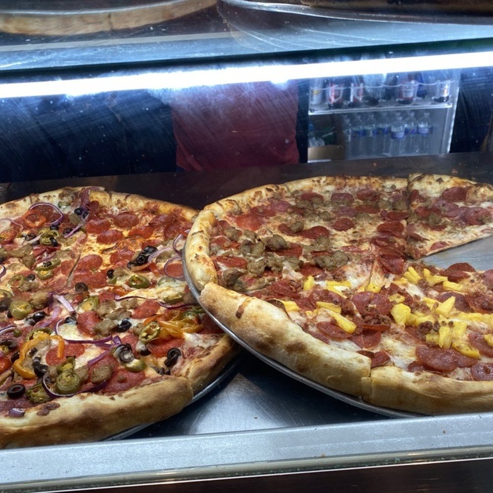Roppolo's Pizzeria - Pizzas in the case - Pizza Near Me - Austin, Texas Roppolo's Pizzeria - Pizzas in the case - Pizza Near Me - Austin, Texas