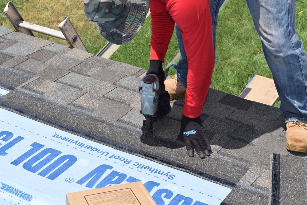 Slide of Top Notch Roofing