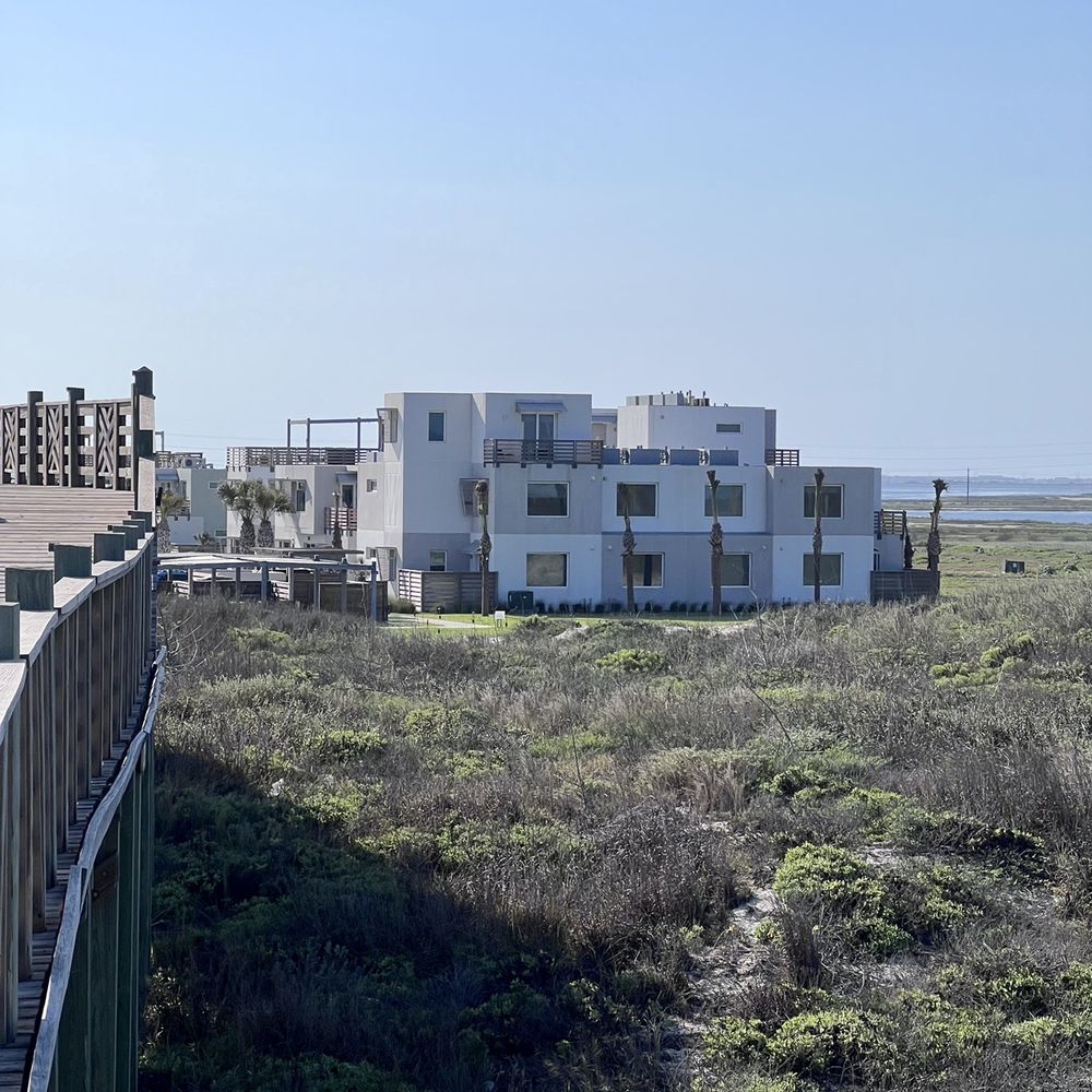 From the beach boardwalk looking at the Lively Beach property