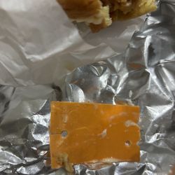 KFC - The Classic Chicken Sandwich and the tag found in the sandwich.