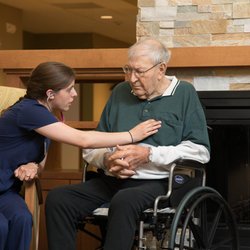 Seasons Hospice - RN/PCC Ginny with patient.