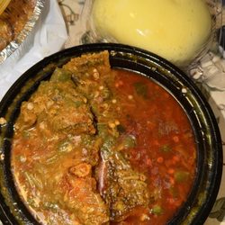 Fufu with okra soup and fried fish
