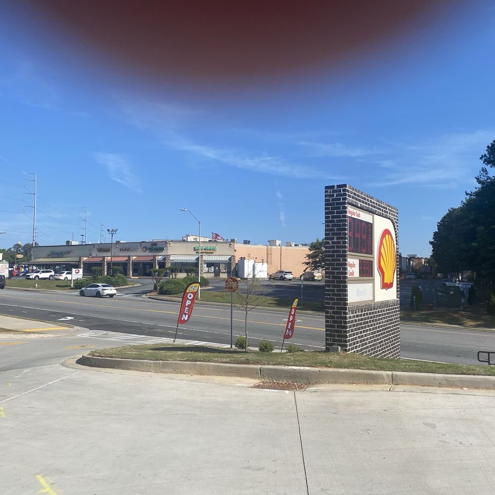 Tesla Supercharger - Sign at entrance - EV Charging Stations Near Me - Norcross, Georgia