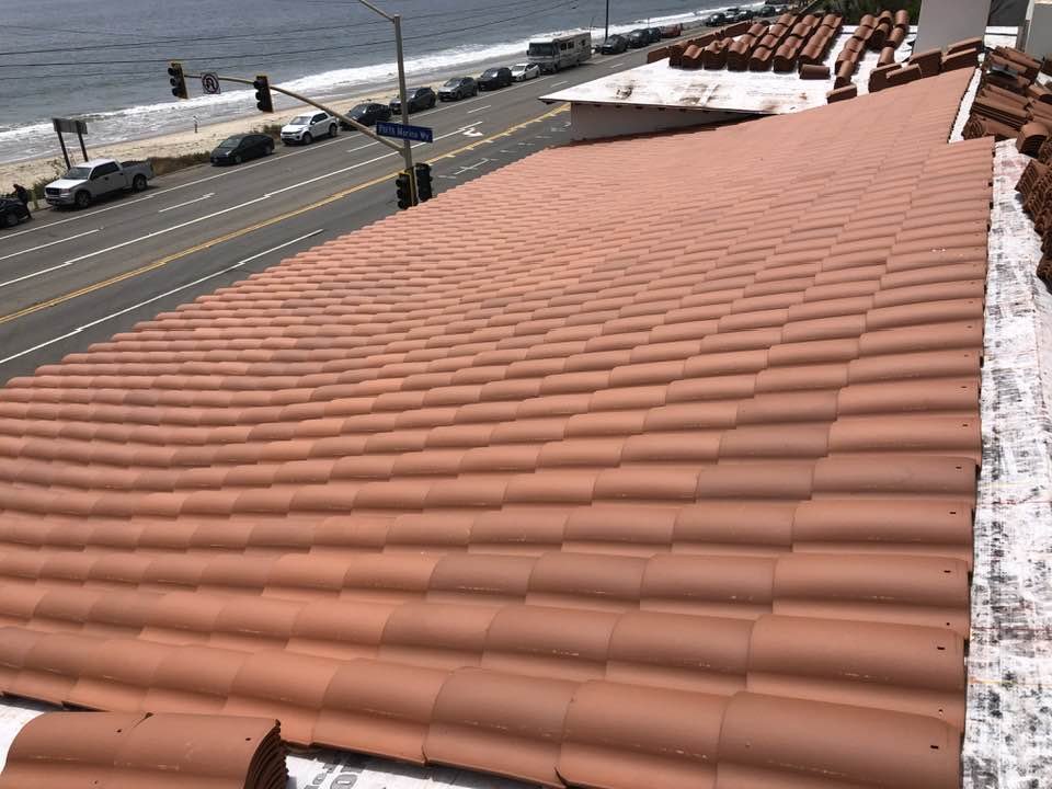 Slide of Santiagos Roofing