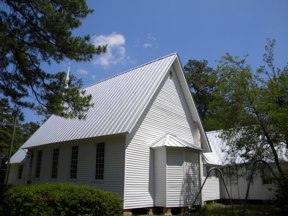 Slide of Tadlock Roofing