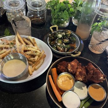 Eureka! - Crispy Glazed Brussels Sprouts Truffle Cheese Fries Wings - American Near Me - Austin, Texas