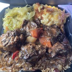 Mango's Cafe - Brown Stew chicken Baked Macaroni  Cabbage  Rice and Peas