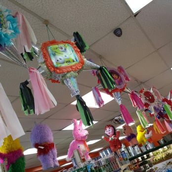 Super Morelos - a variety of decorations hanging from the ceiling - Bakeries Near Me - Indianapolis, Indiana