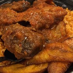 Beef, chicken Jollof rice with fried plantains. Beef, chicken Jollof rice with fried plantains.