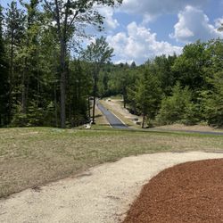 Lakes Region Paving - 520' long driveway in newly constructed home