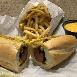 Jimmie The Beef Guy - Maxwell Polish sandwich and a side of fries w/ cheese sauce.