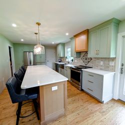 Blue Cord Contracting - Kitchen remodel with custom kitchen cabinets. Cabinets are shaker style, solid wood cabinets finished with Benjamin Moore Saybrook Sage