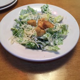 Caesar salad doesn't come with croutons. Had to ask. They brought 5 small ones. Caesar salad doesn't come with croutons. Had to ask. They brought 5 small ones.
