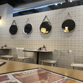 Toast 'N Jams - ables and chairs in a restaurant - Breakfast & Brunch Near Me - Norton Shores, Michigan