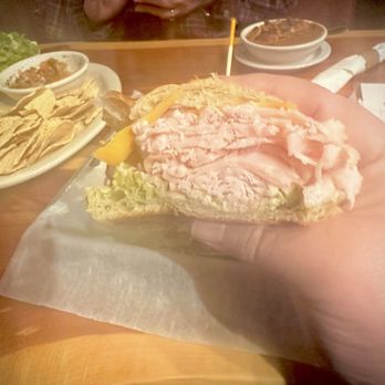 Feral Pig - Club Sandwich (No tomato), with wife's Birdseed Salad, Chicken Chili and our cucumber Salsa and chips in the background. - Desserts Near Me - Fayetteville, Arkansas