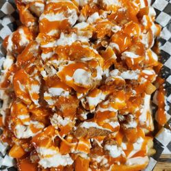 Kiki’s Chicken Place - Kikis fries and chicken strips the spicy sweet chili is on point