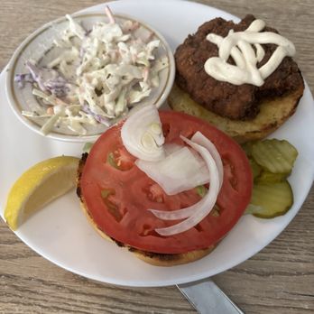 Melanie's Seafood - Crabcake sandwich with coleslaw - Seafood Near Me - Lake Wales, Florida Melanie's Seafood - Crabcake sandwich with coleslaw - Seafood Near Me - Lake Wales, Florida