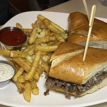 The Sparklings - Philly Cheesesteak with truffle fries - New American Near Me - Las Vegas, Nevada The Sparklings - Philly Cheesesteak with truffle fries - New American Near Me - Las Vegas, Nevada