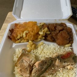 V n S Soulfood kitchen - Salmon over rice, yams, and Mac n cheese