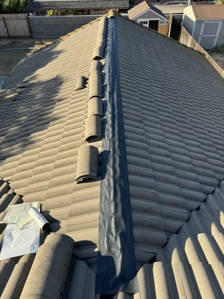 Slide of Alvarado Roofing & Construction