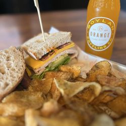 Helena Avenue Bakery - Turkey Sandwich with chips & an orange soda