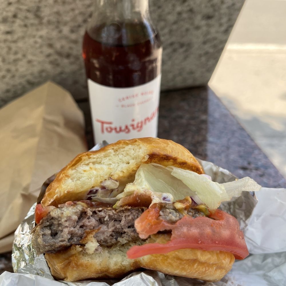 Regular burger and dark cherry soda