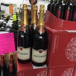 Topline Wine & Spirits - Small bottle of Champagne $230.