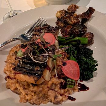 Monterey Bay Fish Grotto - Bluenose bass with mushroom risotto and some fried brussel sprouts - Seafood Near Me - Pittsburgh, Pennsylvania